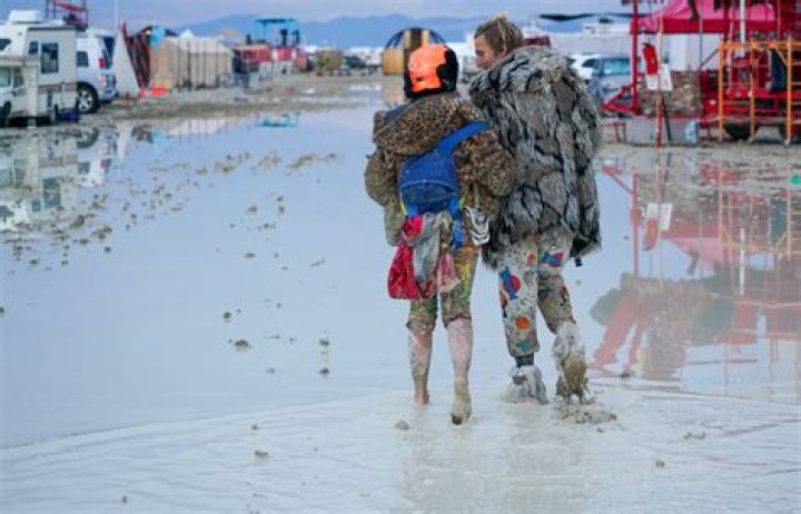 Burning Man 2023 Turned Into Flooding Man With Torrential Rain, One Death, & A Nevada Desert Mass Exodus